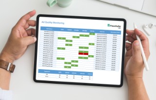 Tablet with screenshot of Fraunhofer IDMT Ad Quality Monitoring
