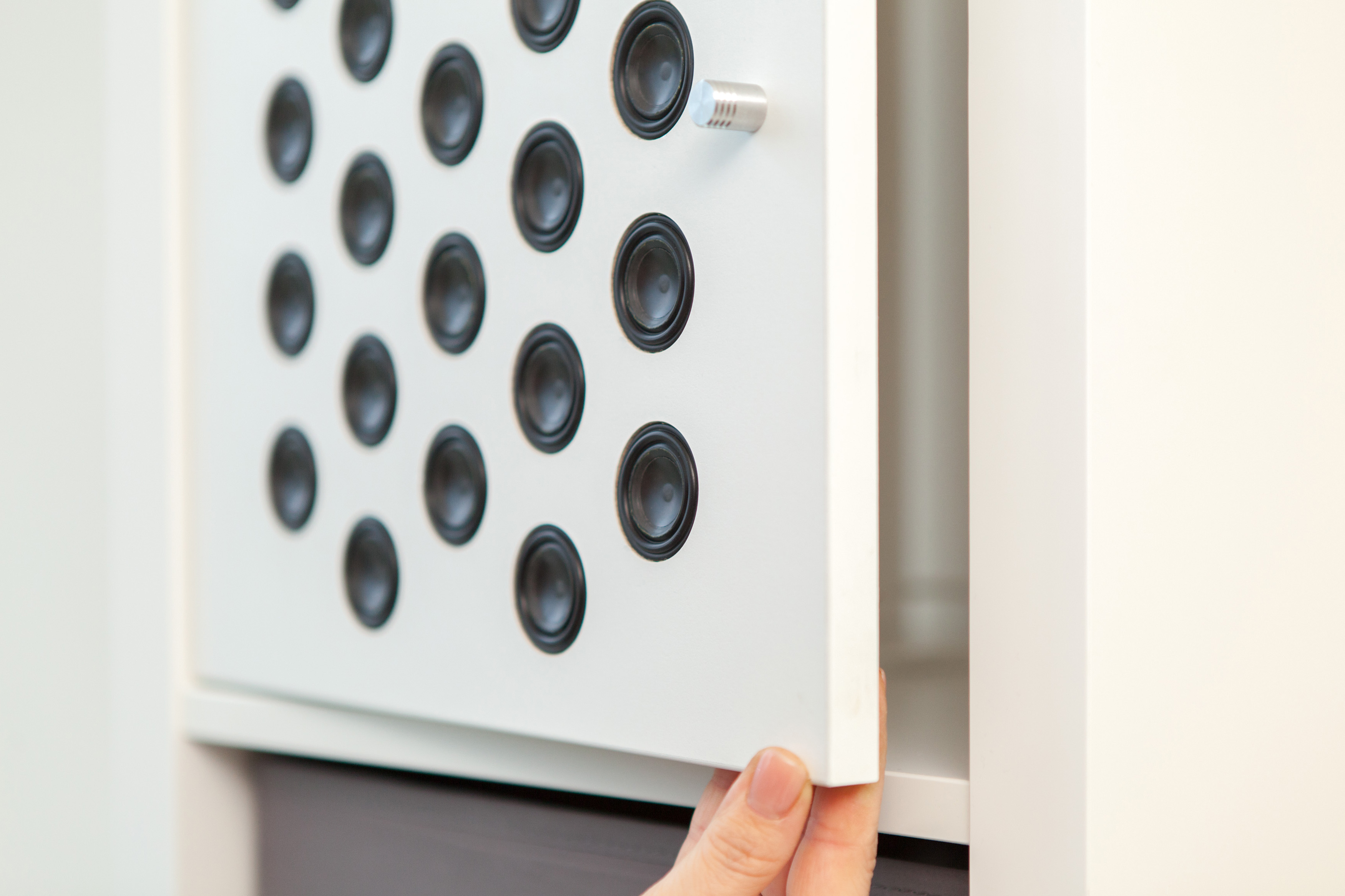 Planar speaker technology installed in a cabinet door.